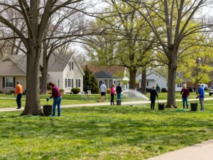 Residents practicing smart tree watering in Plymouth MI during spring.