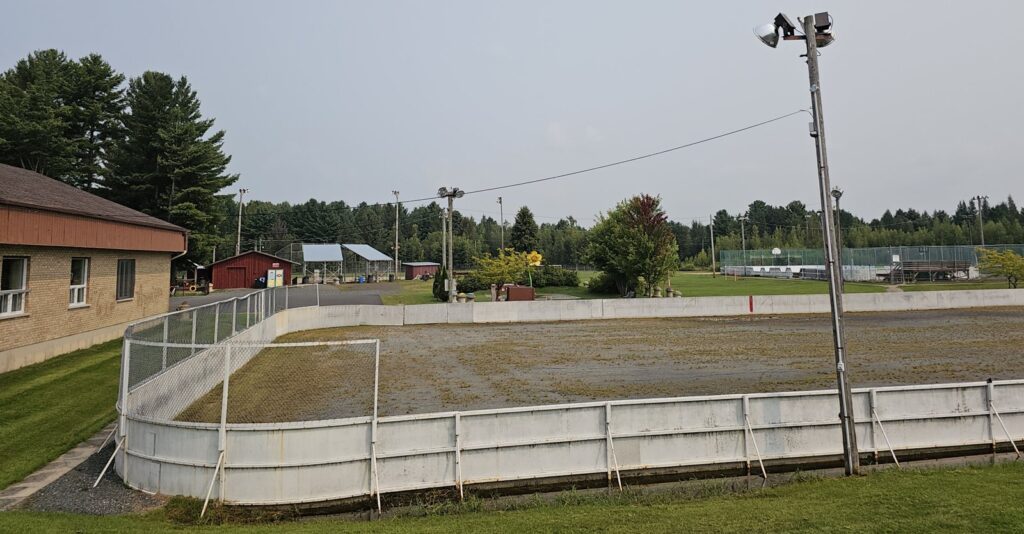 Outdoor hockey rink with boards